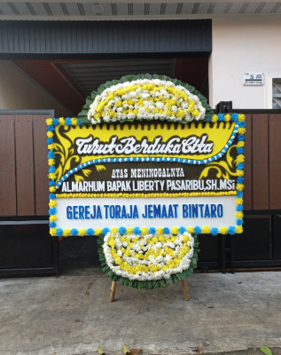 Papan Bunga Duka di Talo